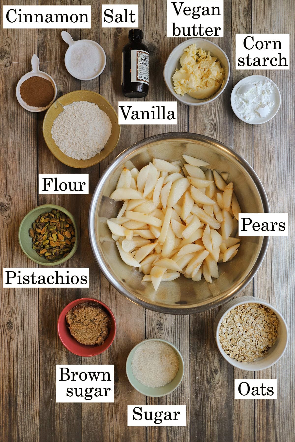 Labeled ingredients for easy pear dessert recipe.