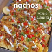 Text overlay: BBQ jackfruit nachos. Vegan & gluten-free. Get the recipe at cadryskitchen.com. Loaded barbecue nachos appetizer baked on sheet pan.