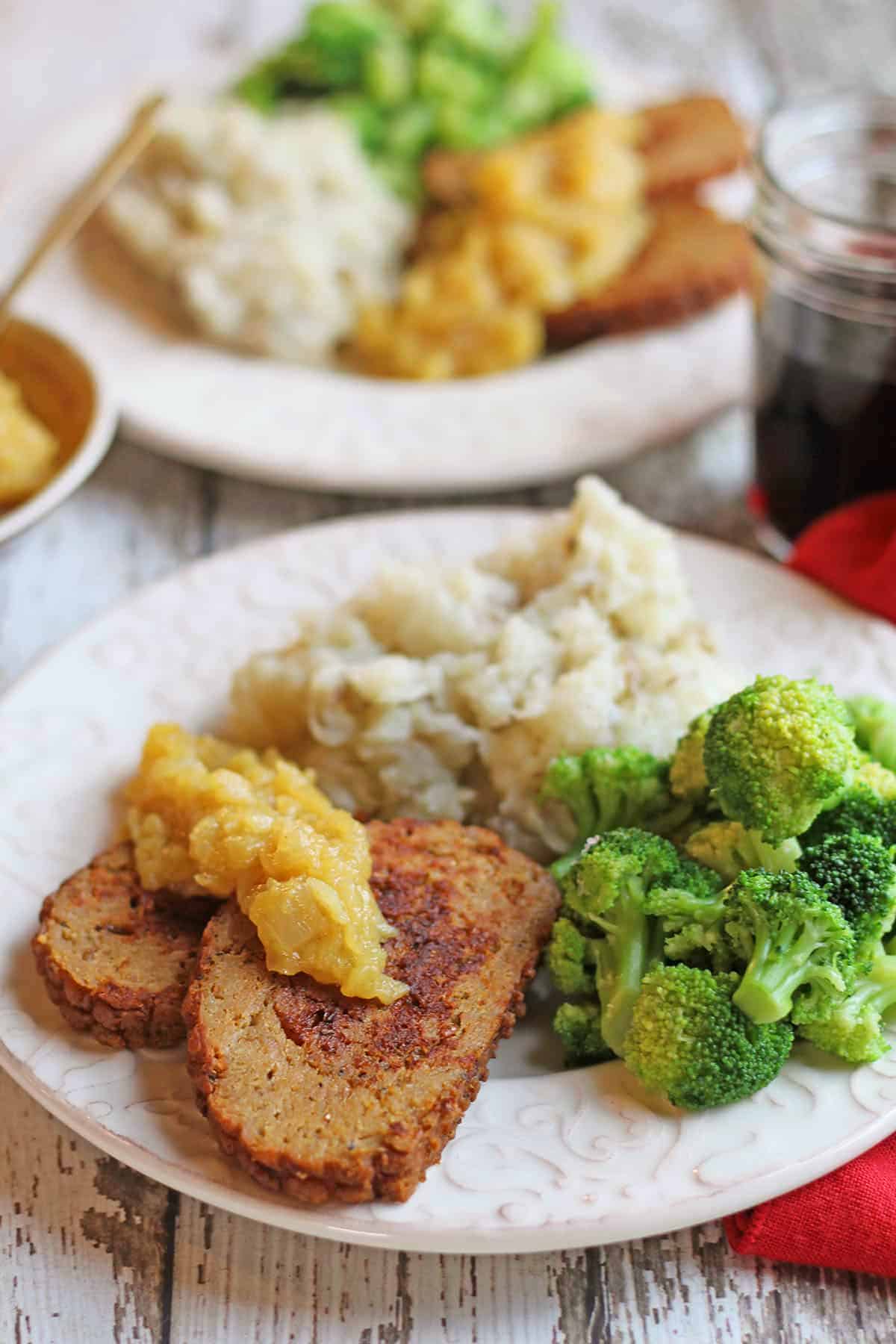 Apple chutney on vegan holiday roast with broccoli and mashed potatoes.