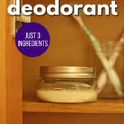 Text overlay: Coconut oil deodorant, just 3 ingredients, get the recipe at cadryskitchen.com. Jar of natural deodorant in medicine cabinet with toothbrushes.
