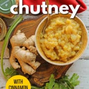 Text overlay: Apple chutney, with cinnamon & ginger, get the recipe at cadryskitchen.com. Apple chutney in bowl by ginger root, cilantro, and cinnamon.