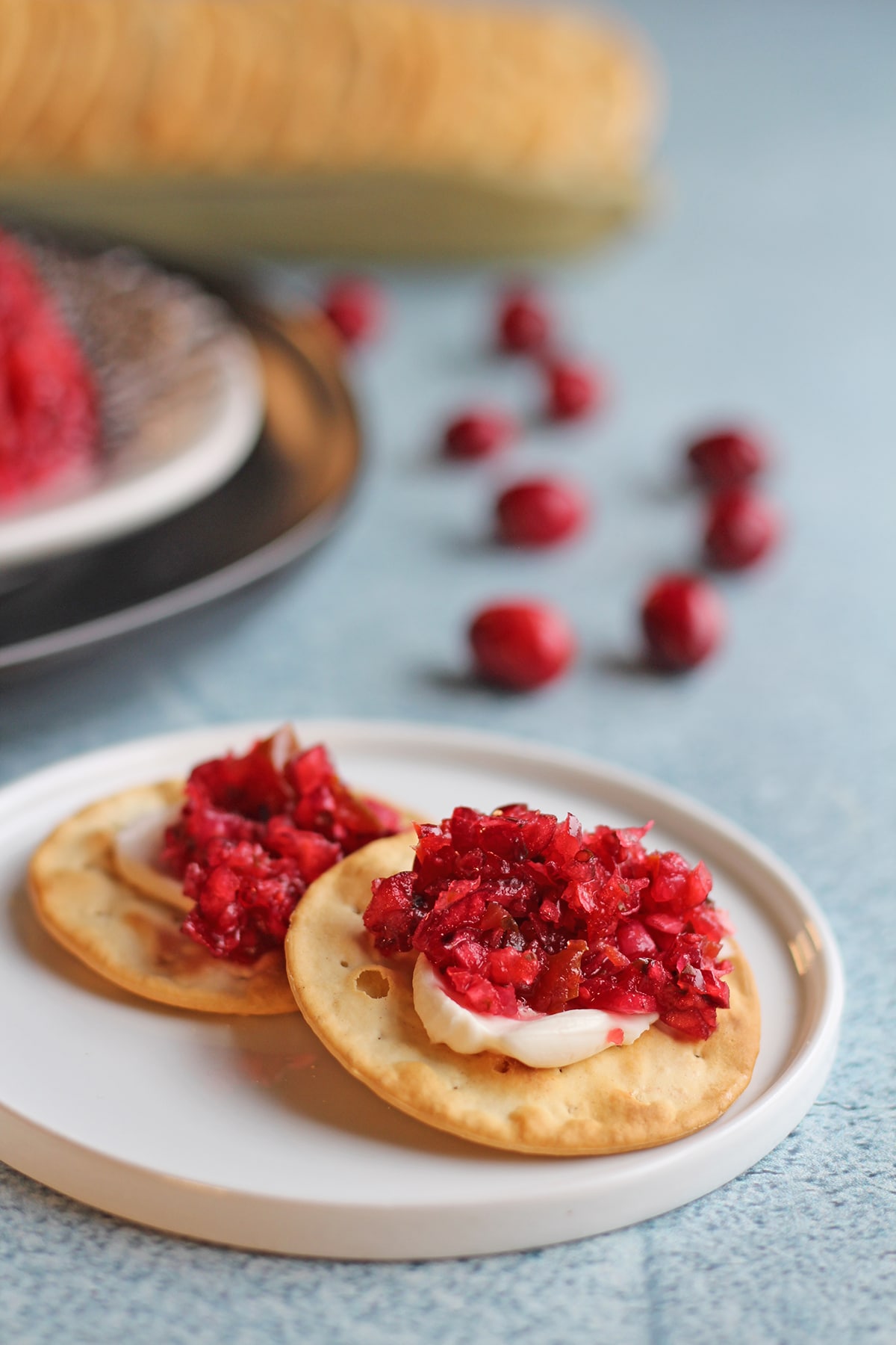 Cranberry jalapeno cream cheese dip on crackers.