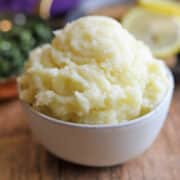 Vegan mashed potatoes in white bowl.