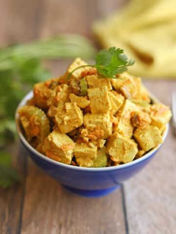 Simple curry tofu salad in bowl for easy vegan lunch.
