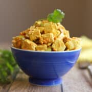 Curried tofu salad with carrots, celery, onion, and raisins.