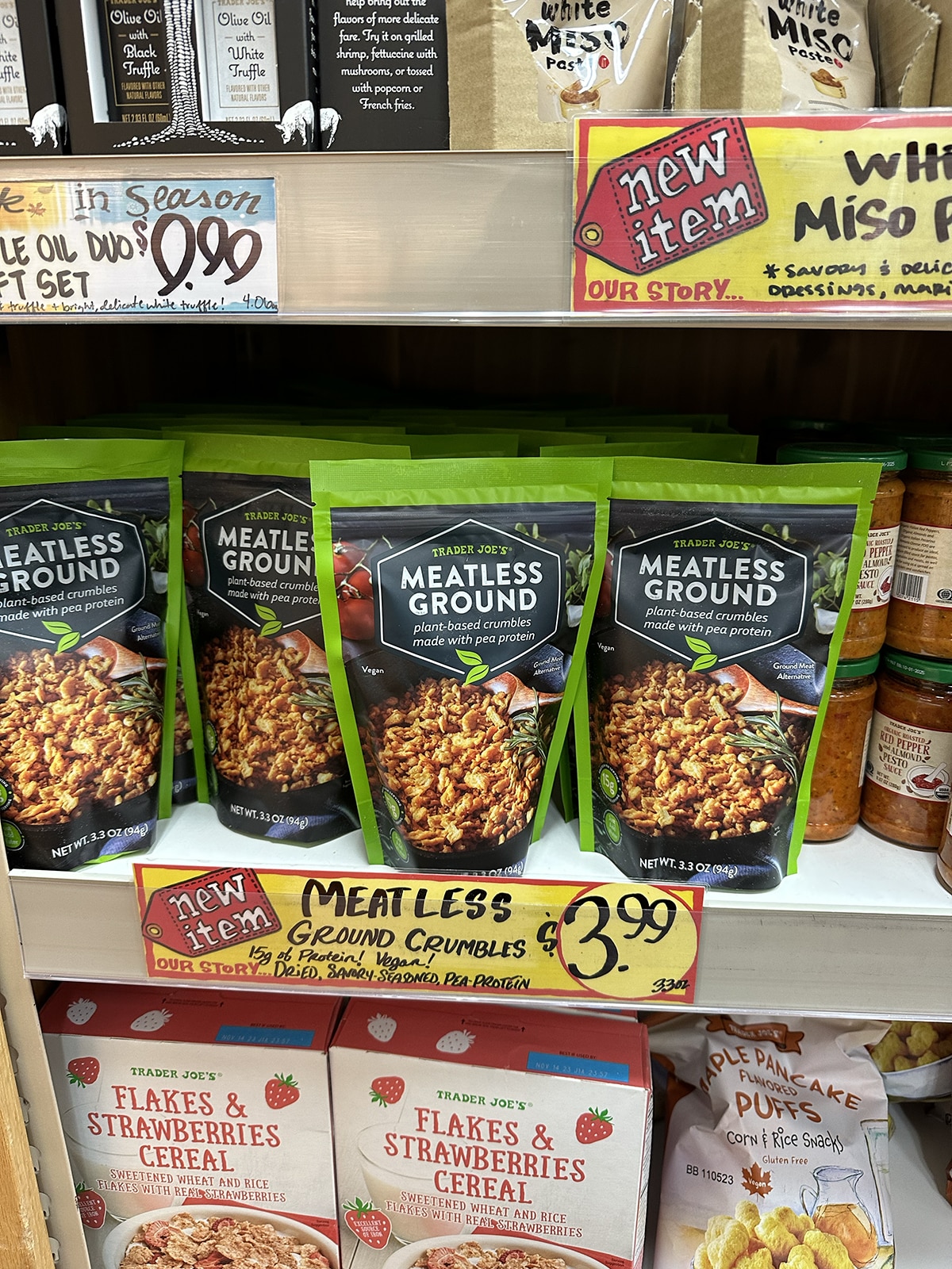 Shelf stable packages of Trader Joe's meatless ground on store shelf.