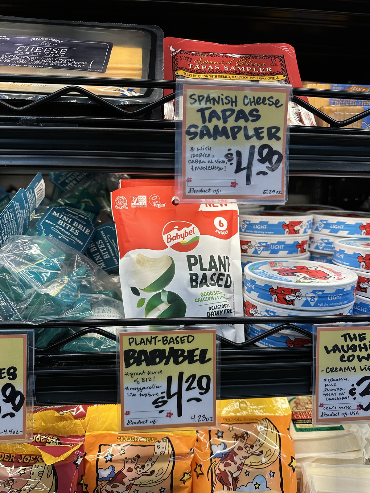 Plant-based Babybel on store shelf at Trader Joe's.