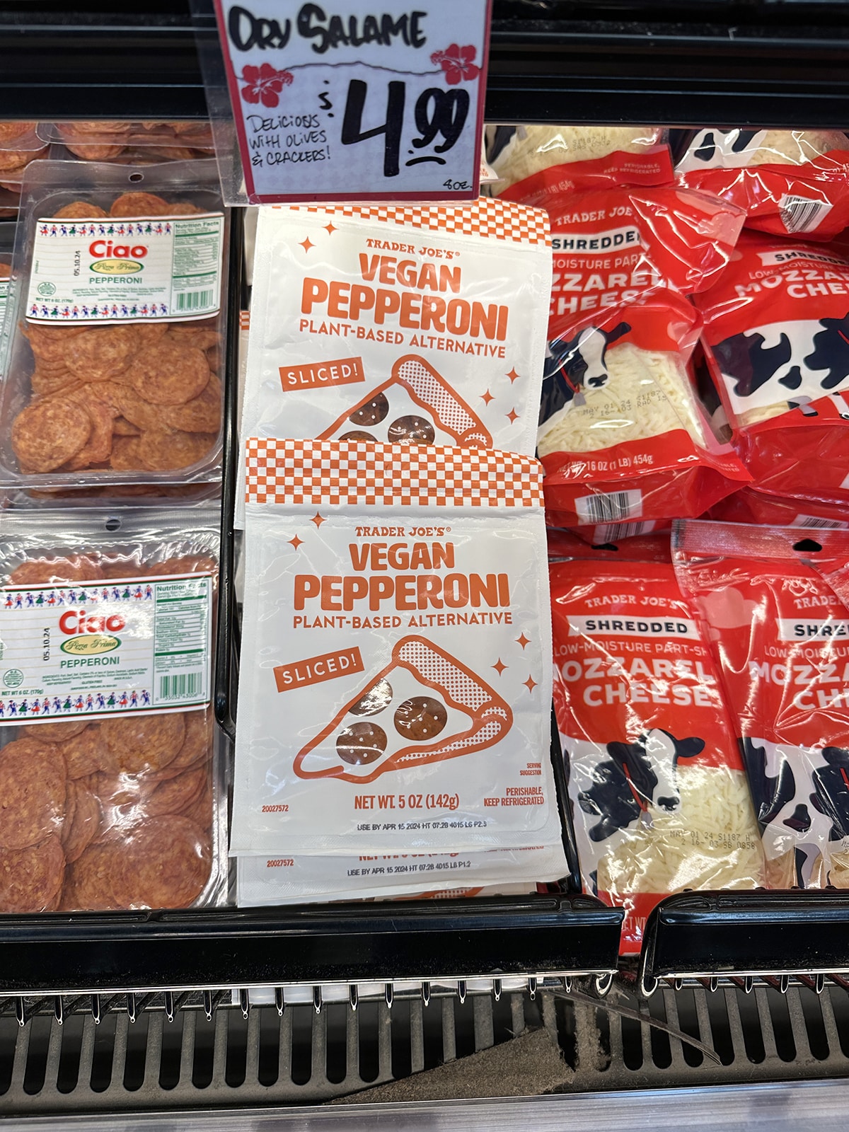 Trader Joe's vegan pepperoni plant-based alternative in refrigerated case at Trader Joe's.