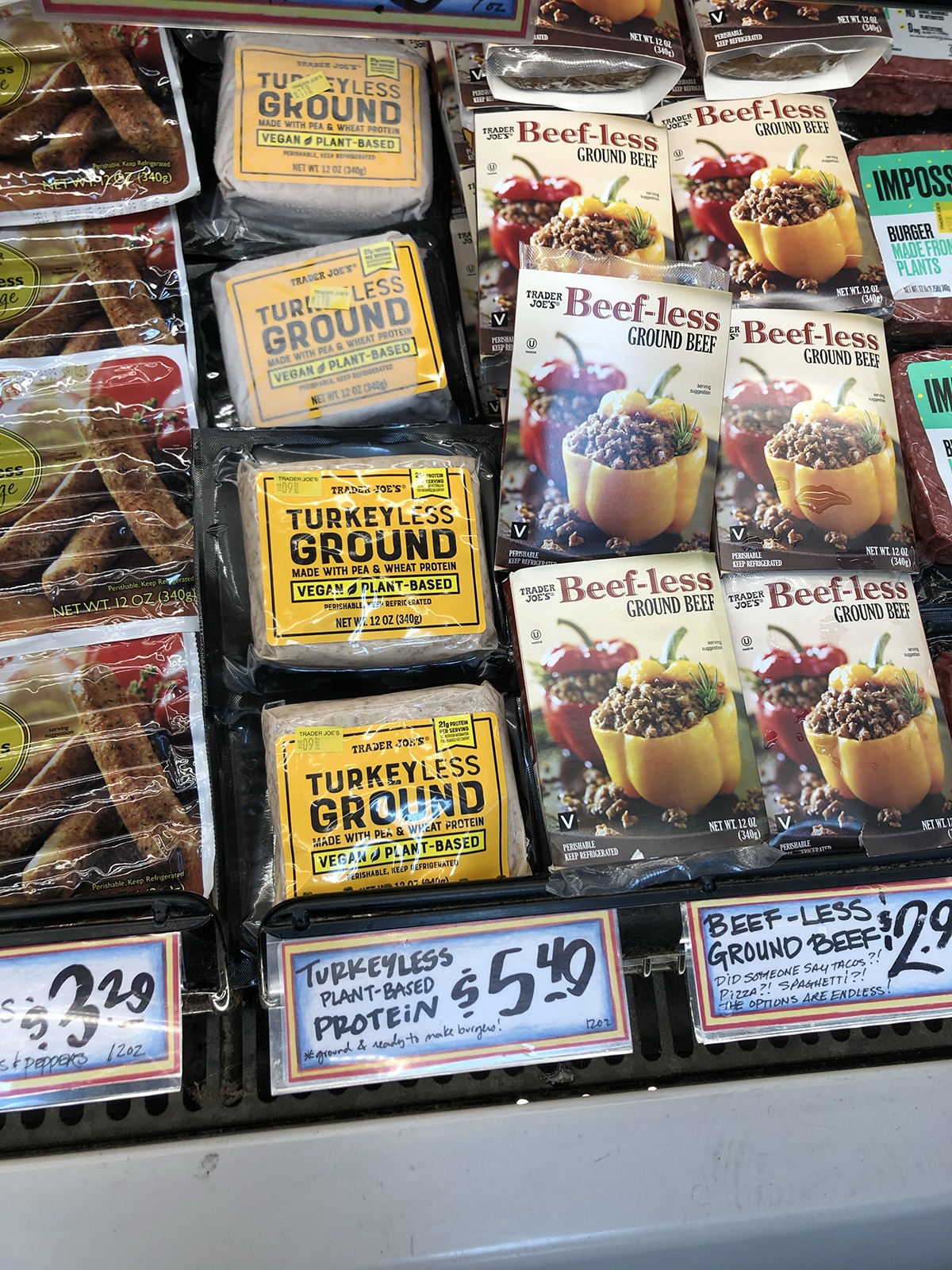 Turkeyless ground and beef-less ground beef in refrigerated case at Trader Joe's.