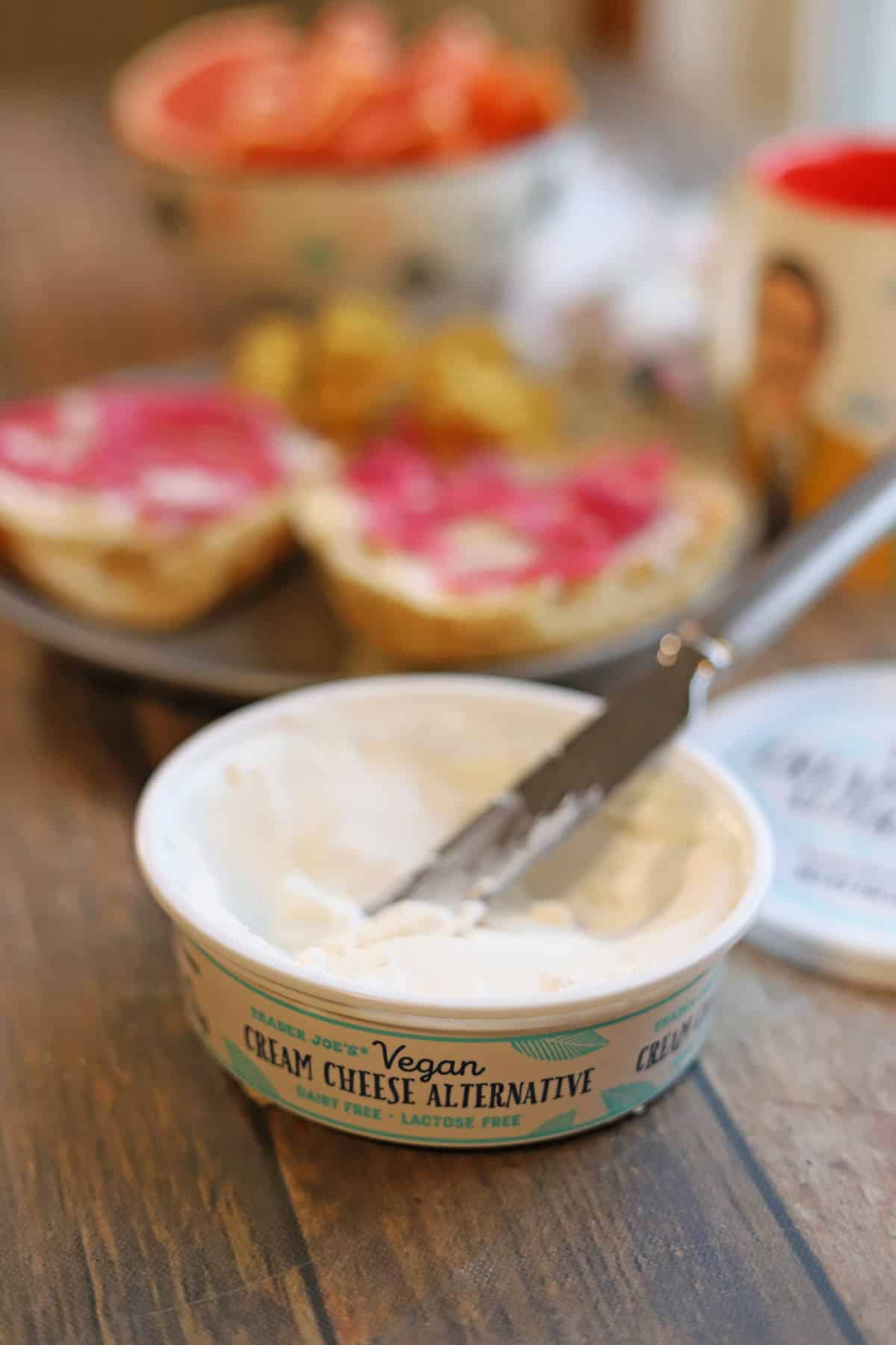 Trader Joe's vegan cream cheese alternative on breakfast table with butter knife.