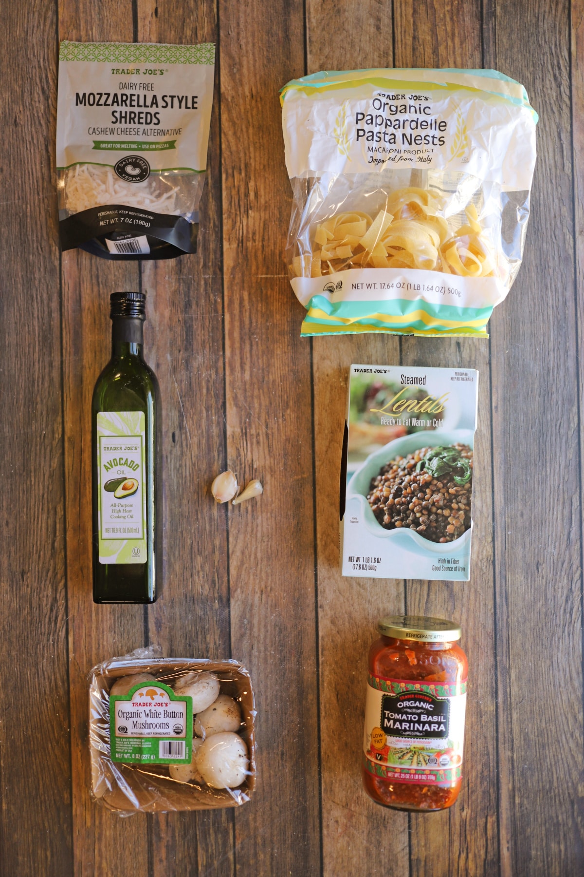 Trader Joe's mozzarella shreds, pappardelle pasta nests, avocado oil, garlic, steamed lentils, mushrooms, and tomato basil marinara.