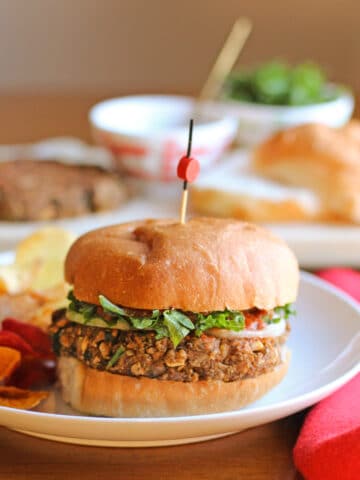 Meatball-inspired lentil burgers with marinara, mushrooms, and kale.