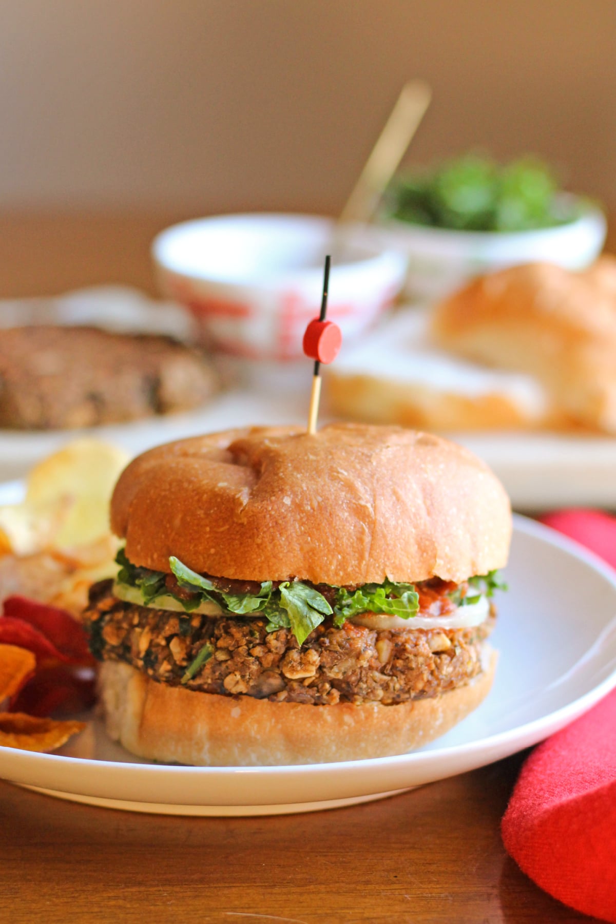 Meatball-inspired lentil burgers with marinara, mushrooms, and kale.