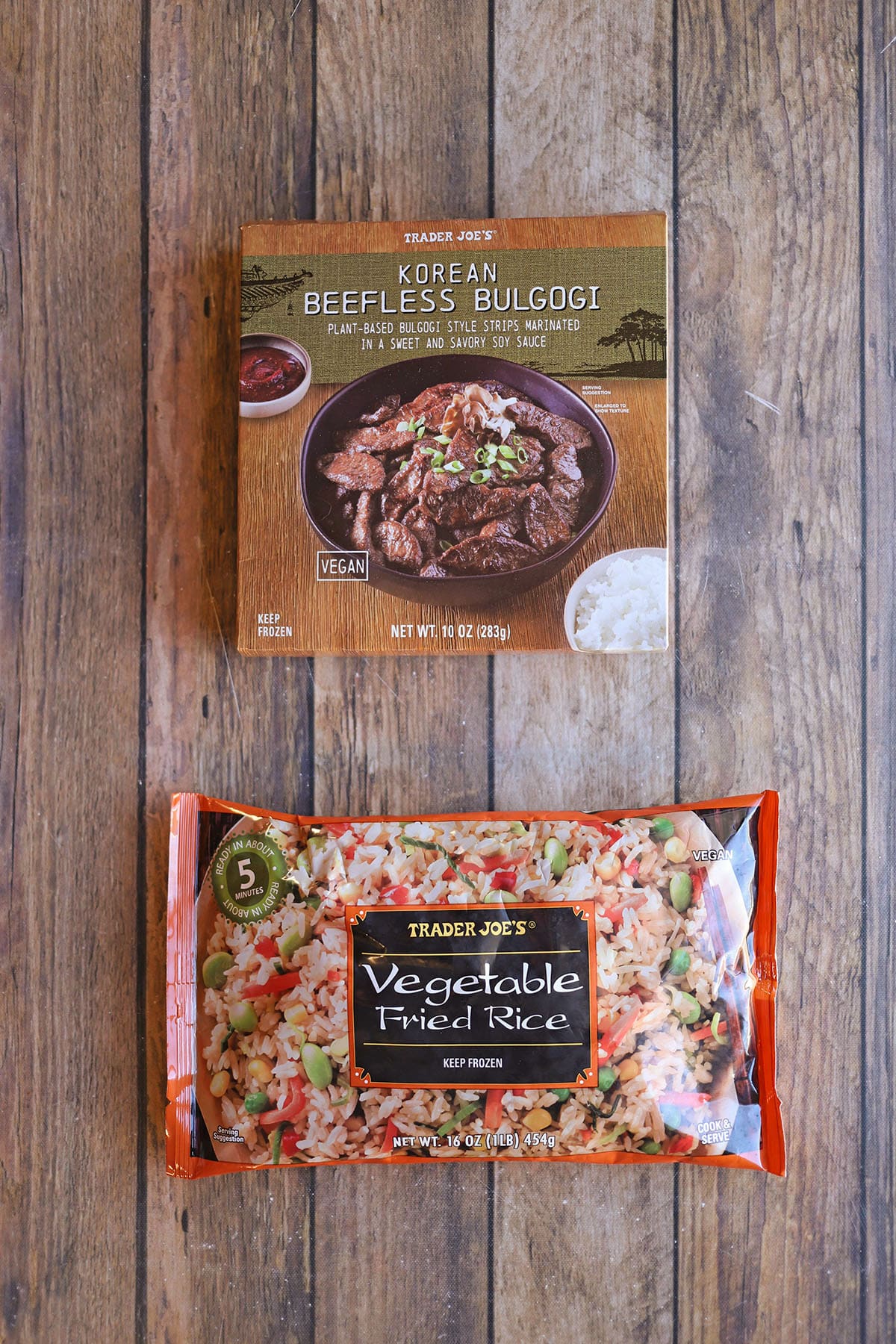 Package of Trader Joe's beefless bulgogi on table with package of vegetable fried rice.