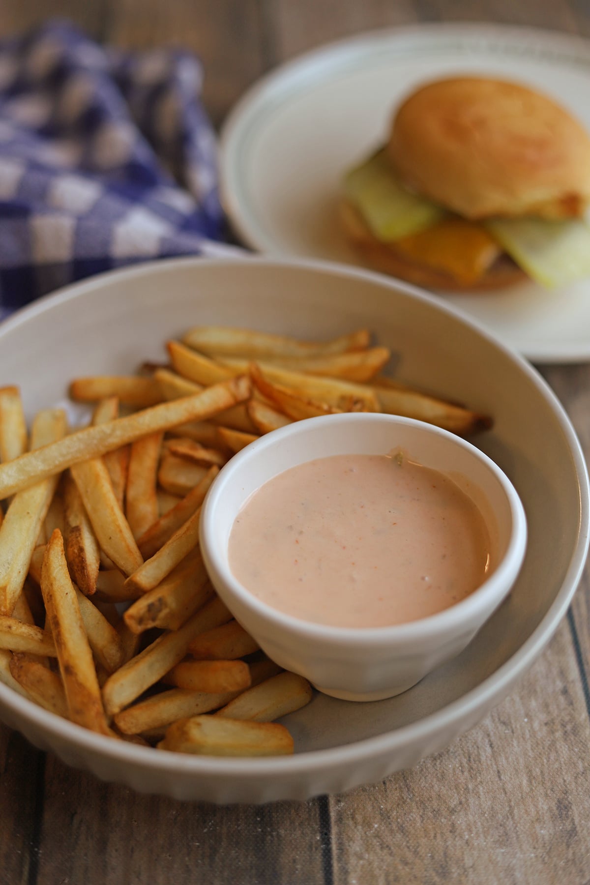 Vegan burger sauce in bowl with fries.