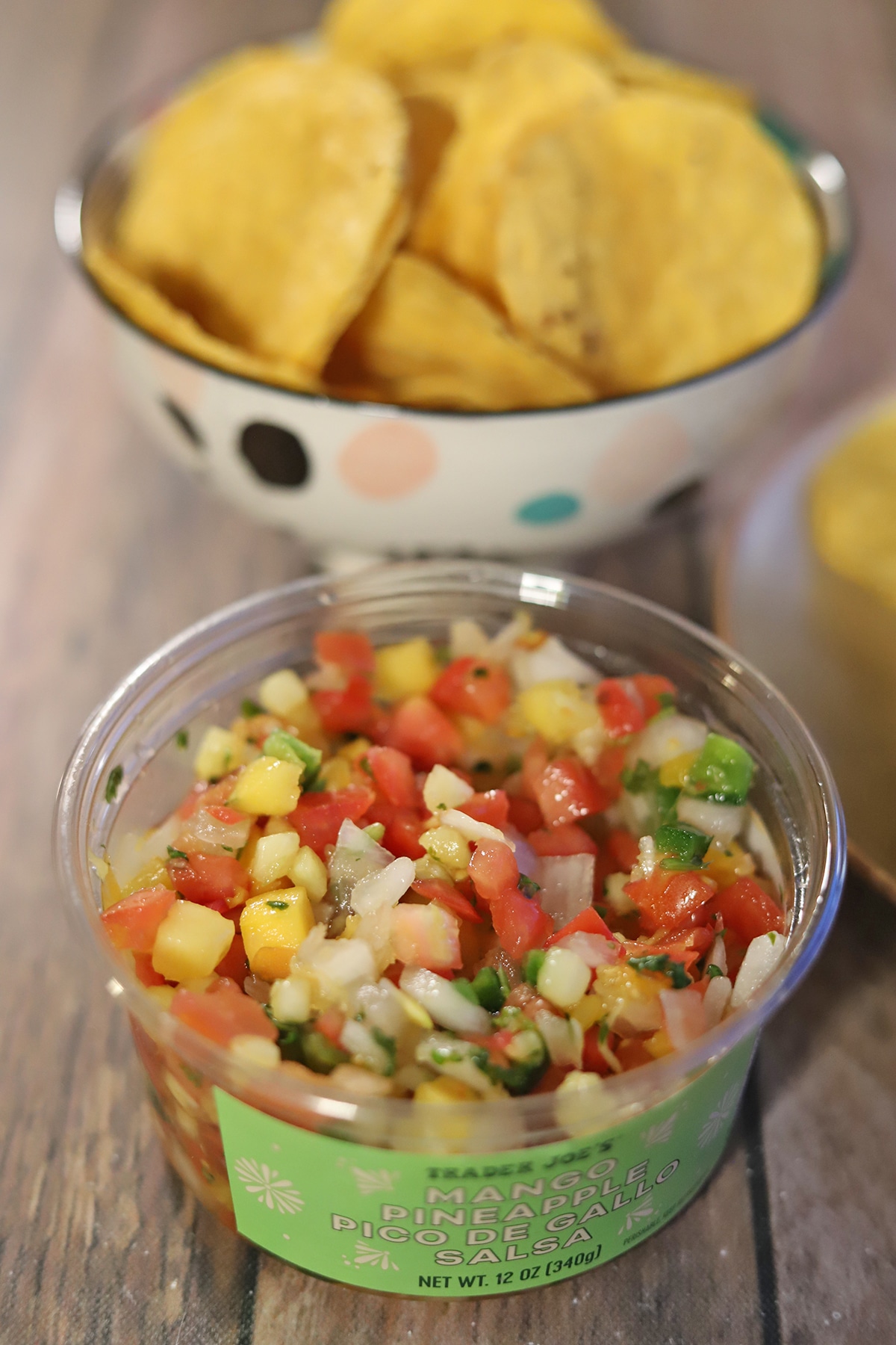 Mango pineapple pico de gallo salsa with tortilla chips.