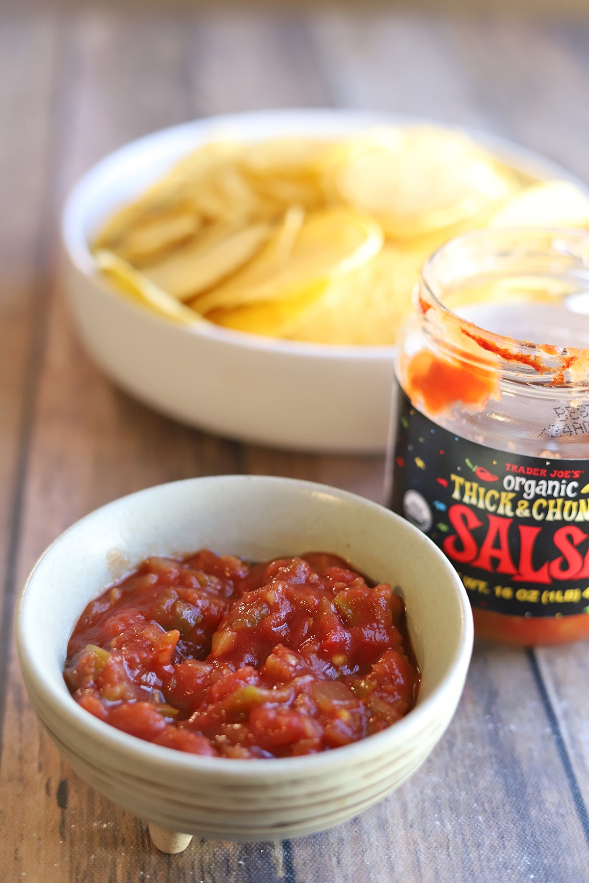 Trader Joe's organic thick and chunky salsa with tortilla chips.