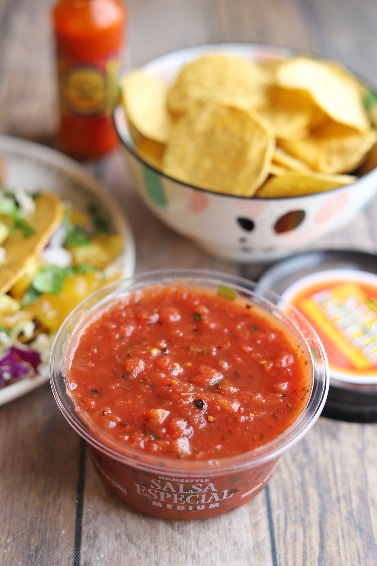 Trader Joe's salsa especial medium with tortilla chips.
