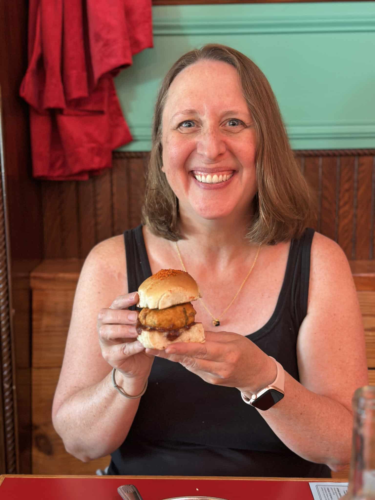 Cadry holding vada pav.