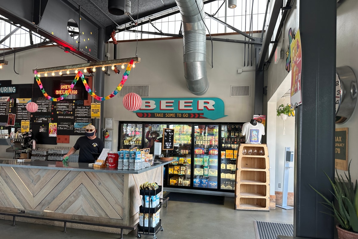 Beer in cases for sale at New Belgium Brewing.
