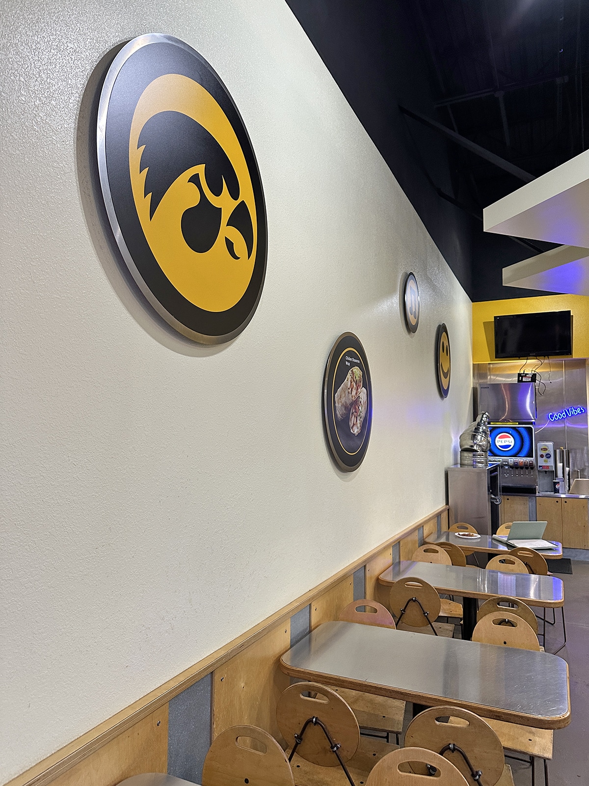 Tables and wall decorations with Herky the Hawk.