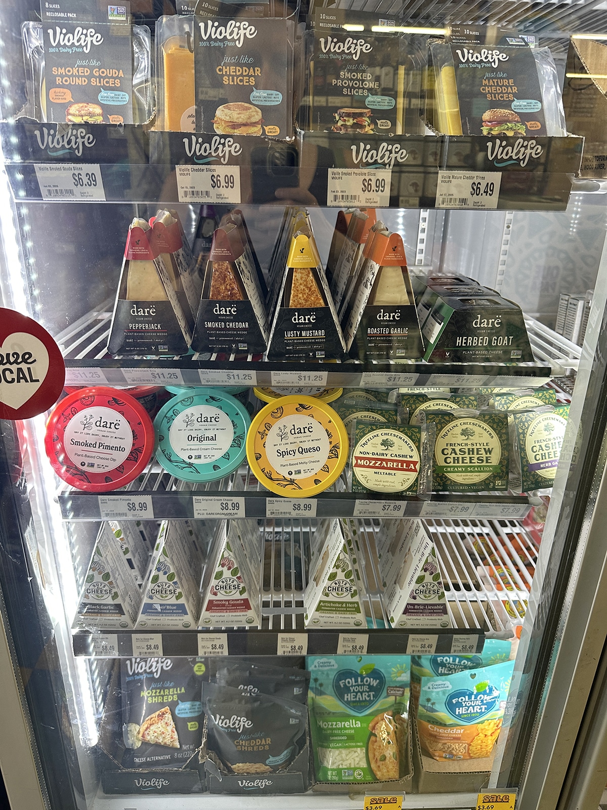 Vegan cheese case at West Village Market in Asheville, NC.