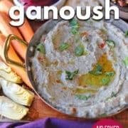 Text overlay: Baba ganoush, air fryer or oven baked, cadryskitchen.com. Metal bowl with creamy baba ganoush by carrots, artichoke hearts, and turnip pickles.