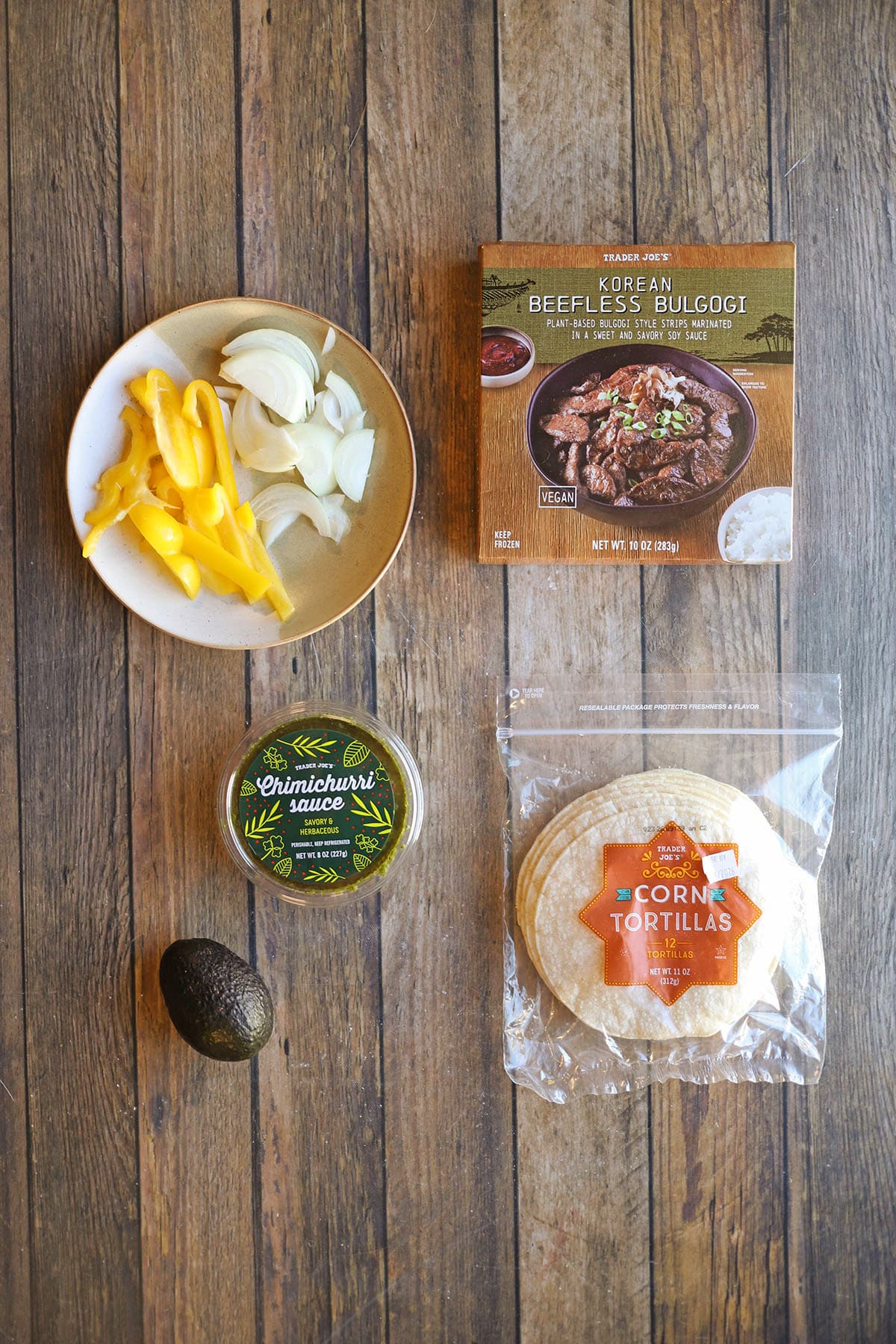 Ingredients for beefless bulgogi fajitas with chimichurri sauce and avocado.
