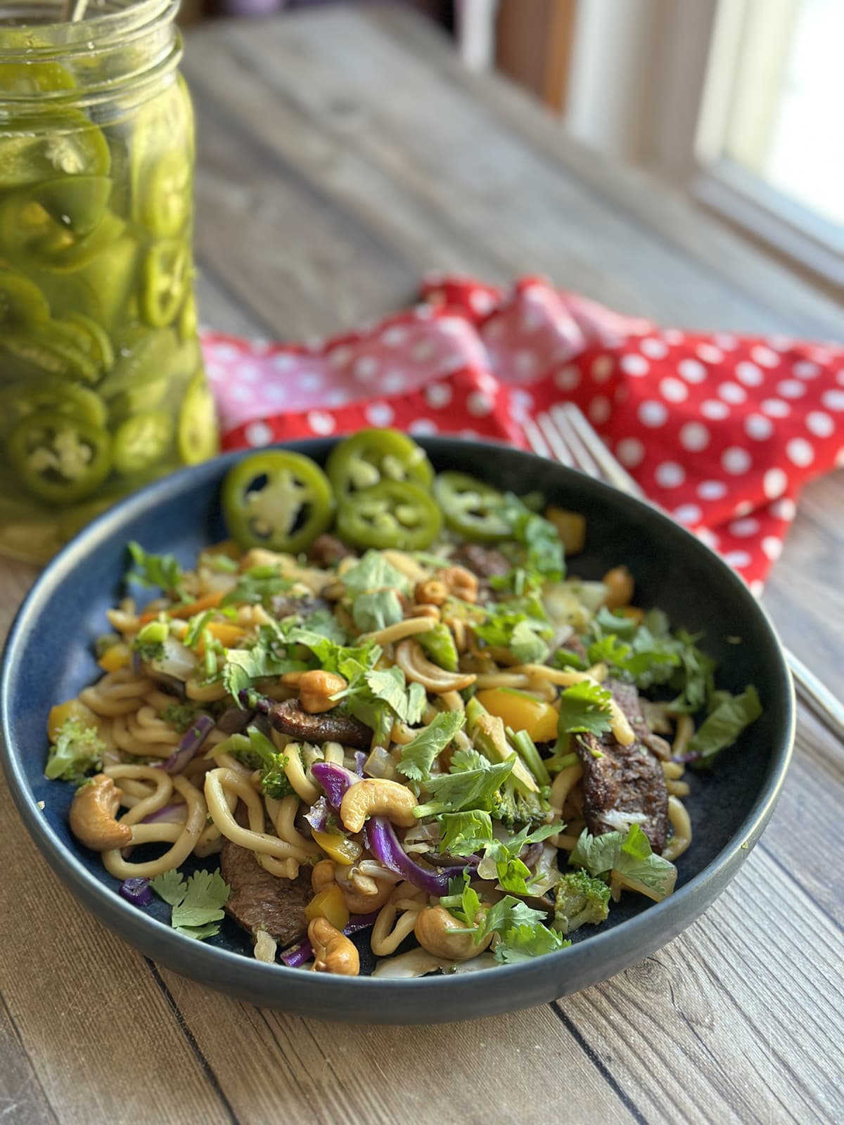 Noodle stir-fry with beefless bulgogi, cilantro, and cashews.