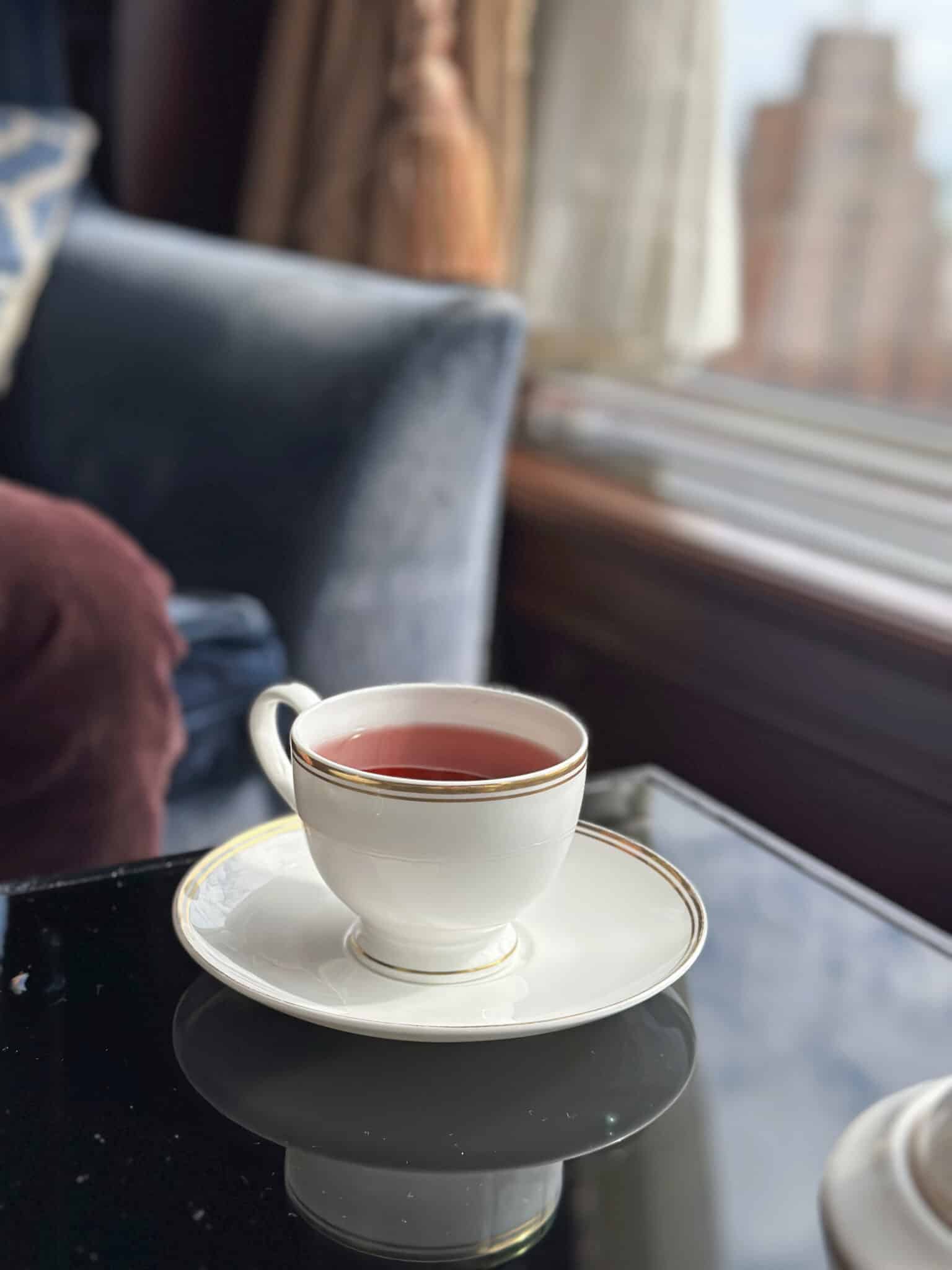 Hibiscus tea in glass on table at Pfister Hotel.
