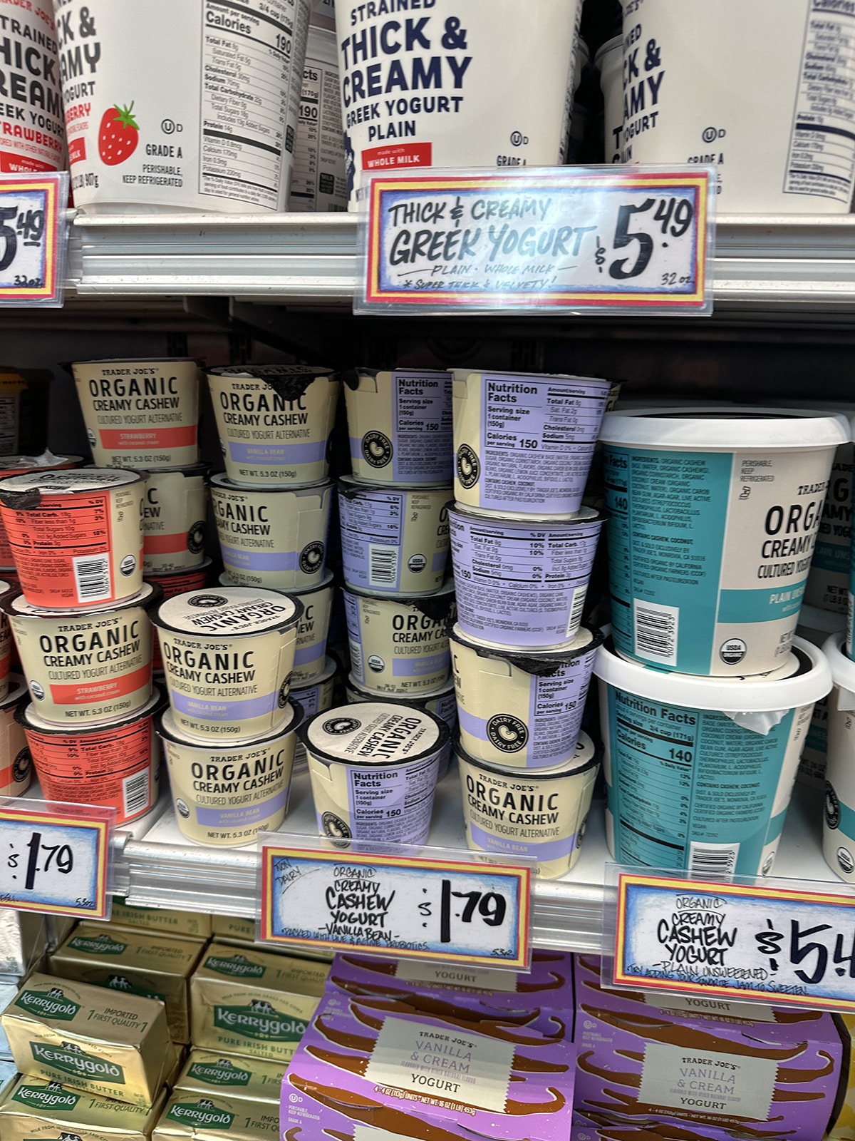 Containers of cashew yogurt on display at Trader Joe's.