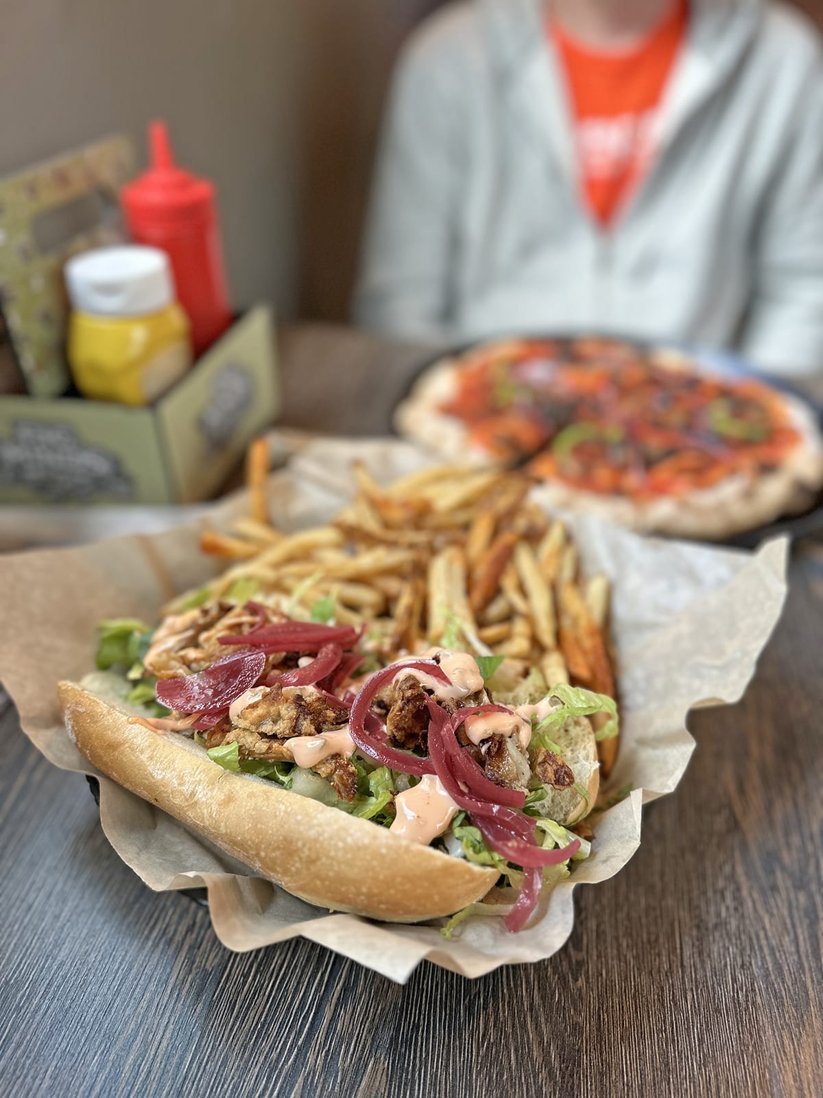 Oyster mushroom po' boy by pizza at Pig Minds Brewing.