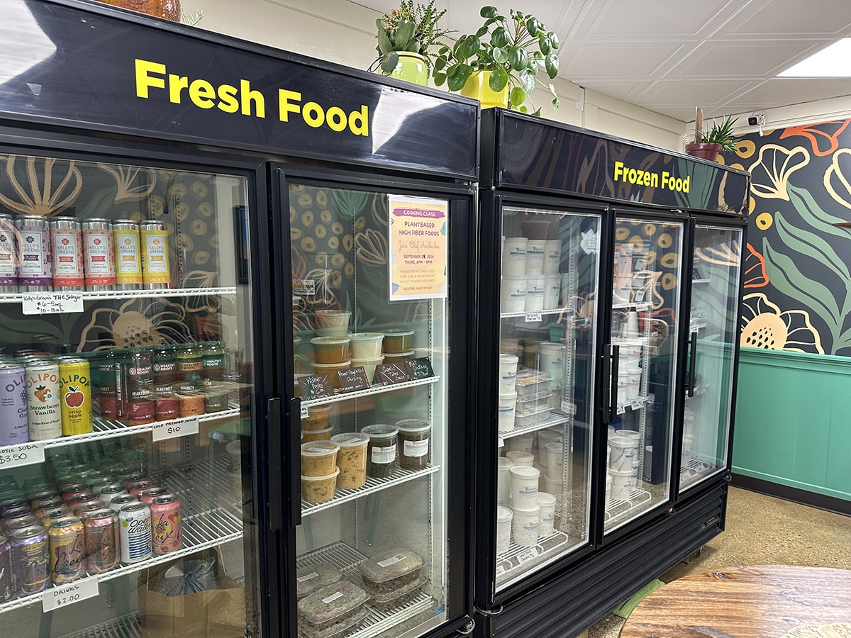 Takeaway cases with prepared foods at Plant Joy Deli.
