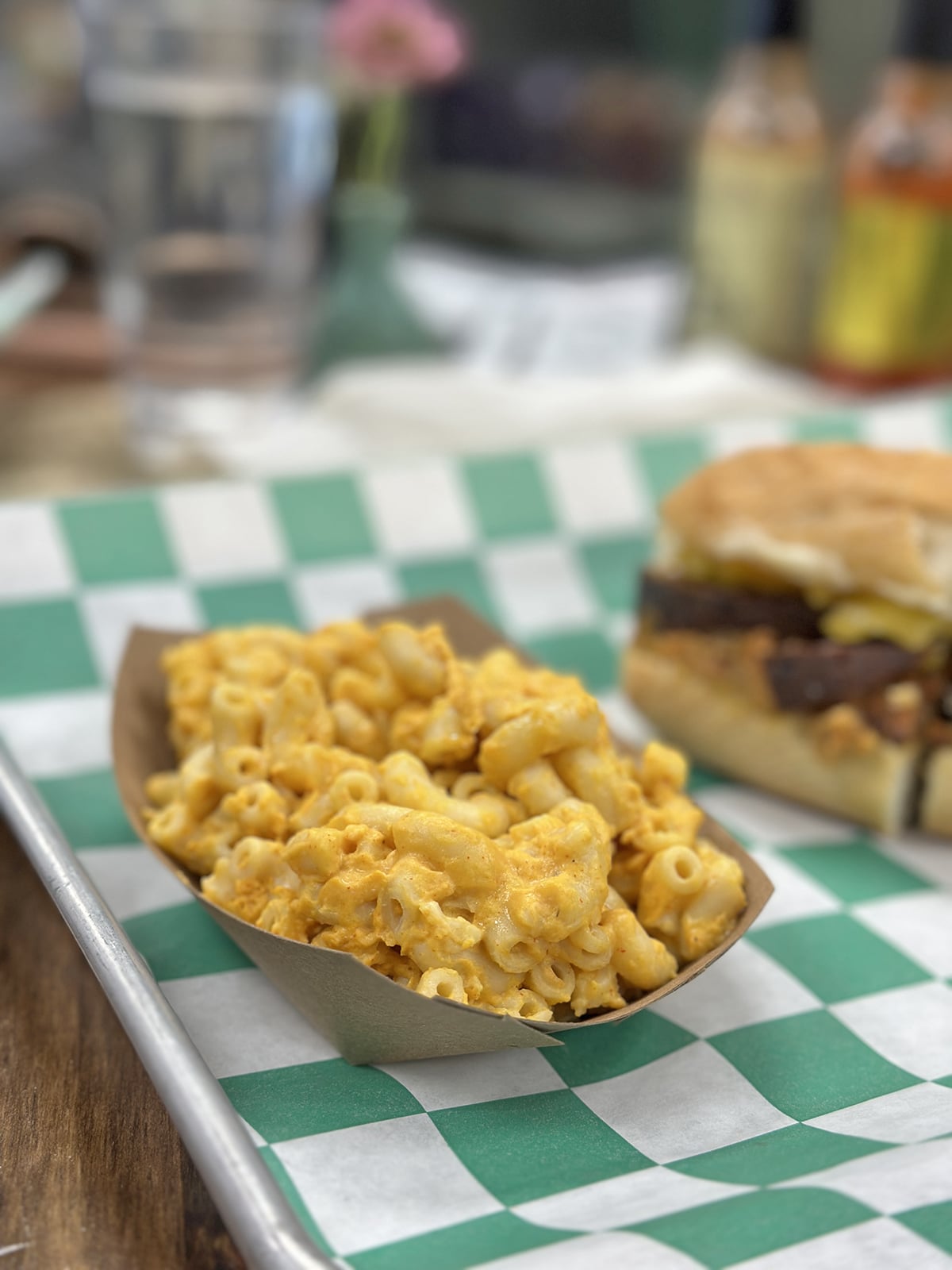 Vegan mac and cheese in paper container.